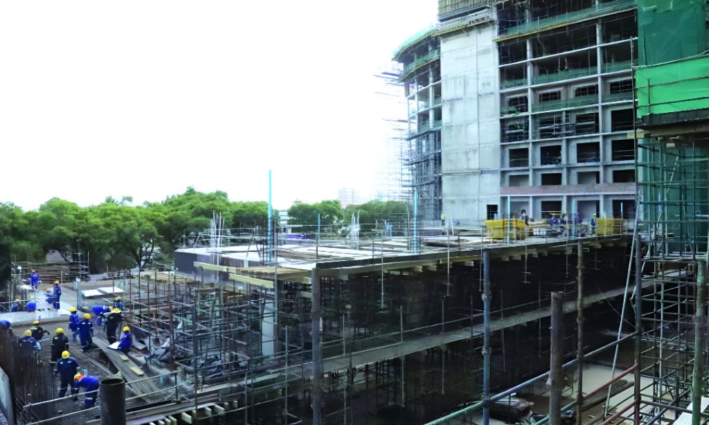 Afrexim Bank House under construction in Kampala with cranes and scaffolding
