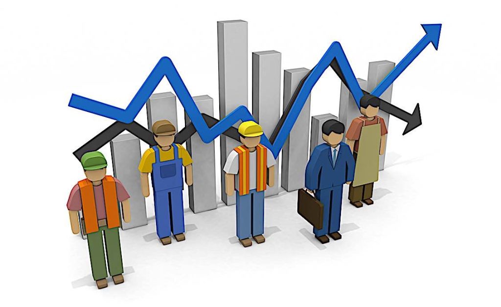 Construction workers and trainees on a building site in Uganda.