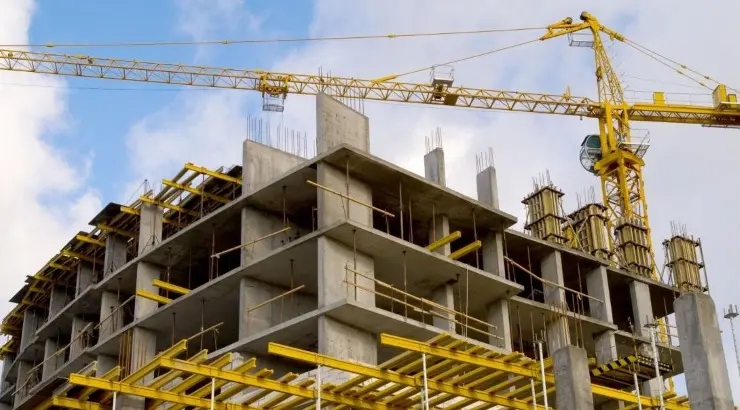 Construction site in Kenya with workers and cranes – Smeaton Constructions job opportunities 2025