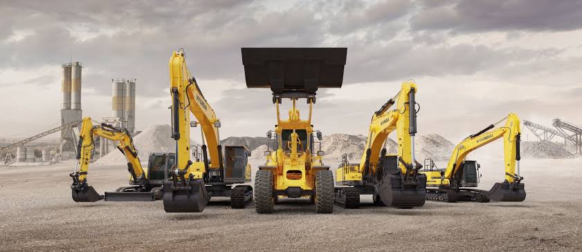 Heavy construction equipment working on a construction site in Uganda